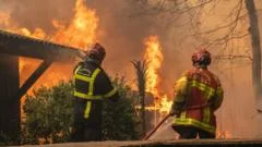 Wildfires Force 250,000 Evacuations in France Spain